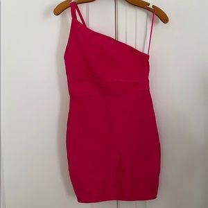 Hot pink one shoulder bandage style dress